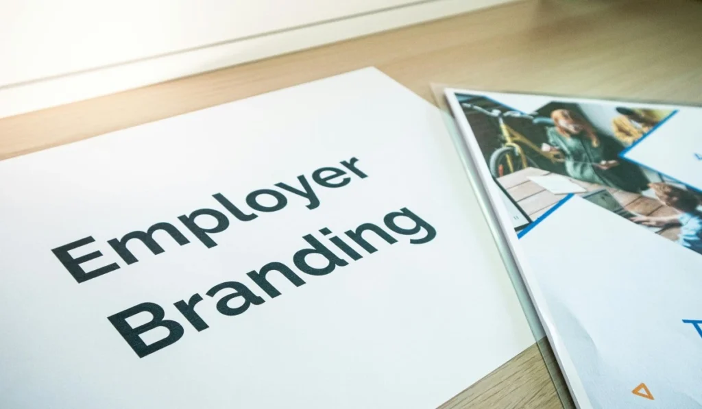 Difference Between Employer Branding and Recruitment Marketing: 7 Powerful Differences That Impact Hiring Success 2 Difference Between Employer Branding and Recruitment Marketing illustrated through workplace culture and digital hiring strategy comparison
